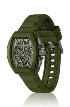 Green skeleton-dial watch with silicone strap