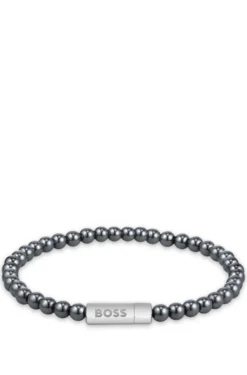 Hematite-bead cuff with logo closure