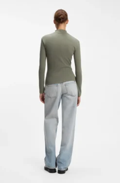 High-neck stretch-cotton top with logo badge