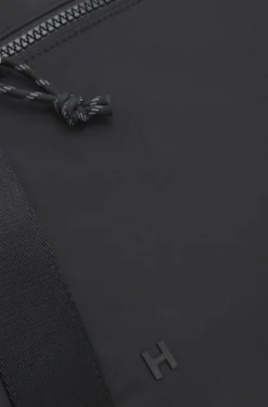 Holdall with wide-set logo detail