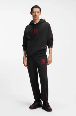 HUGO x RB stretch-cotton tracksuit bottoms with bull motif