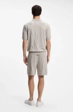 Johnny-collar knit polo with graphic pattern