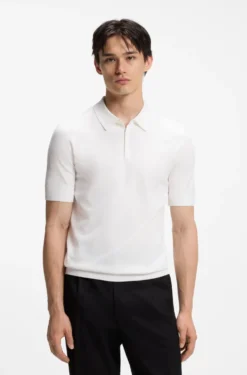 Knit polo with covered placket