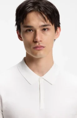 Knit polo with covered placket