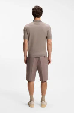 Knit polo with covered placket