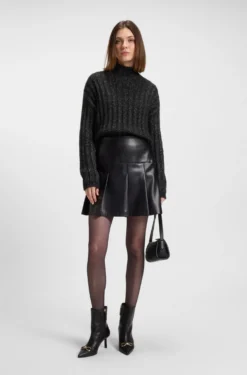 Knitted sweater with ribbed structure