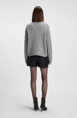 Knitted sweater with ribbed structure