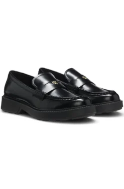 Leather loafers with penny trim and stacked logo