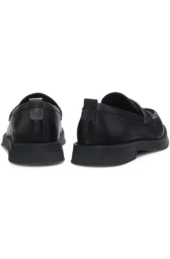 Leather loafers with perforated logos