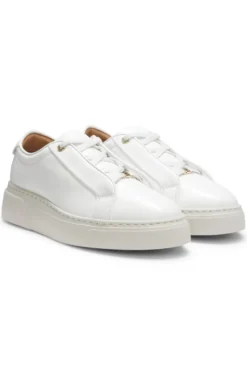 Leather trainers with inner wedge