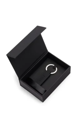 Logo key ring in black silicone and brass