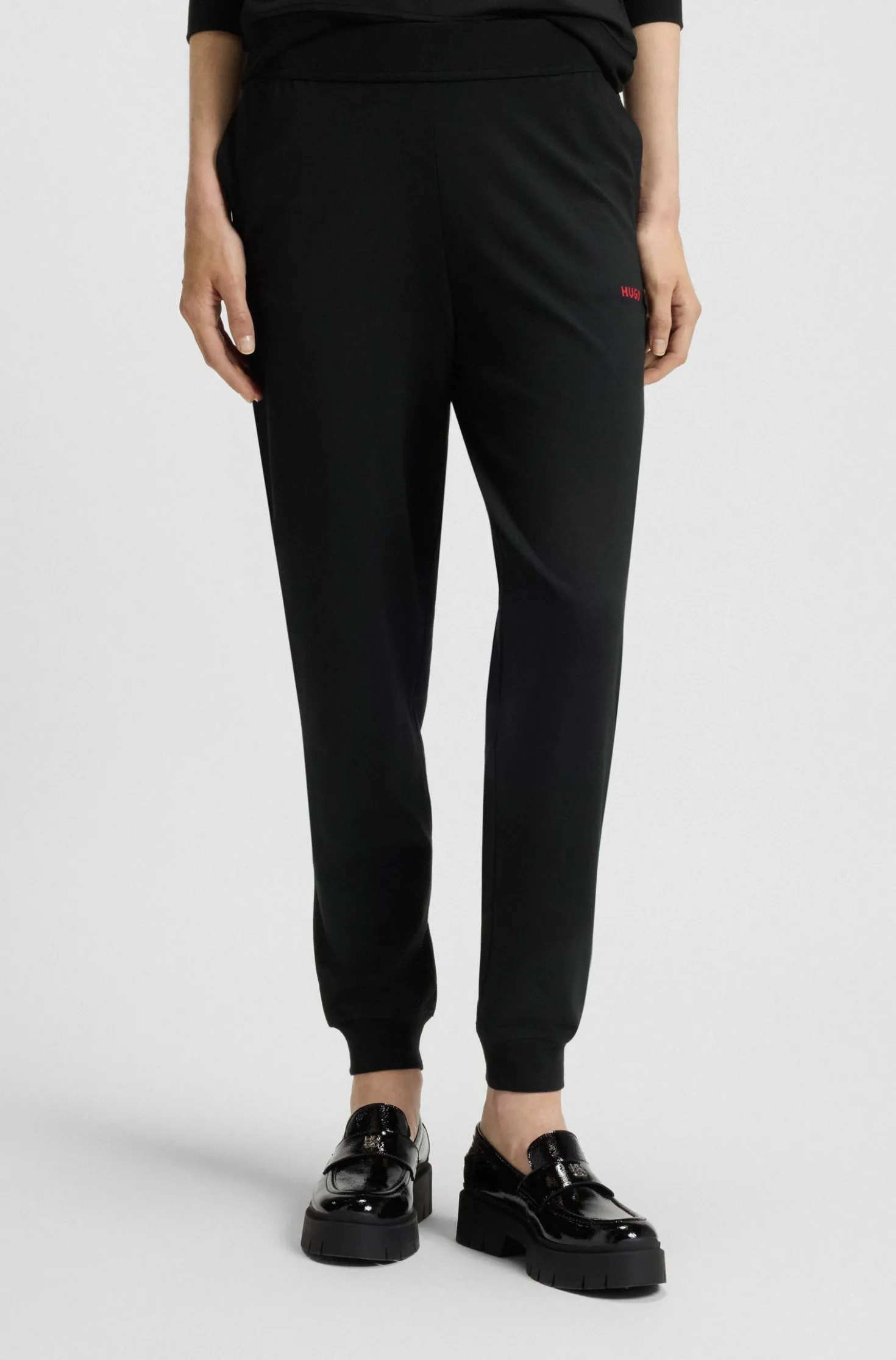 Logo-print tracksuit bottoms in stretch modal and cotton