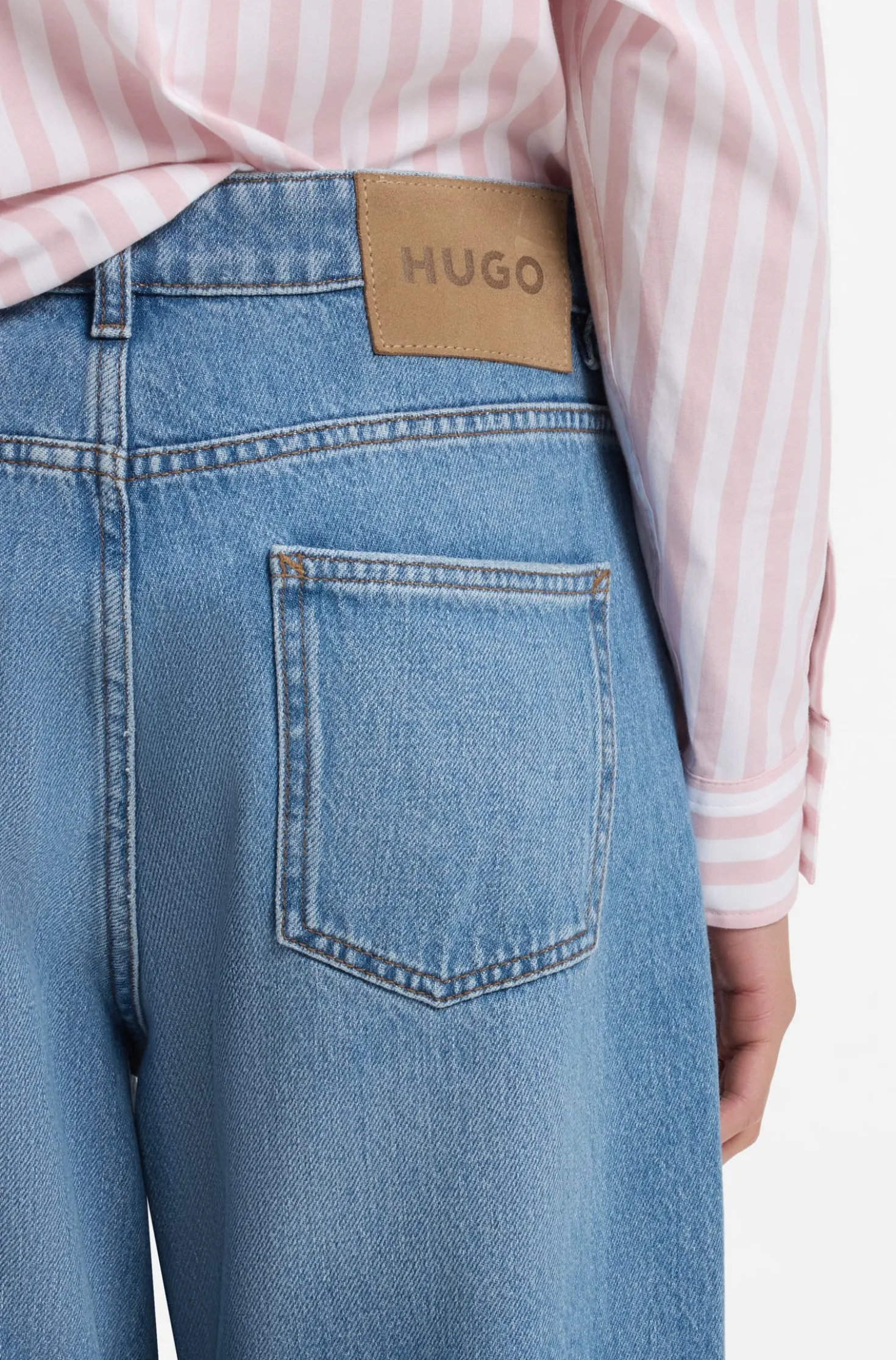 Loose-fit wide-leg jeans with charm accents