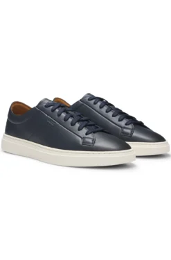 Low-top trainers in leather with embossed logo