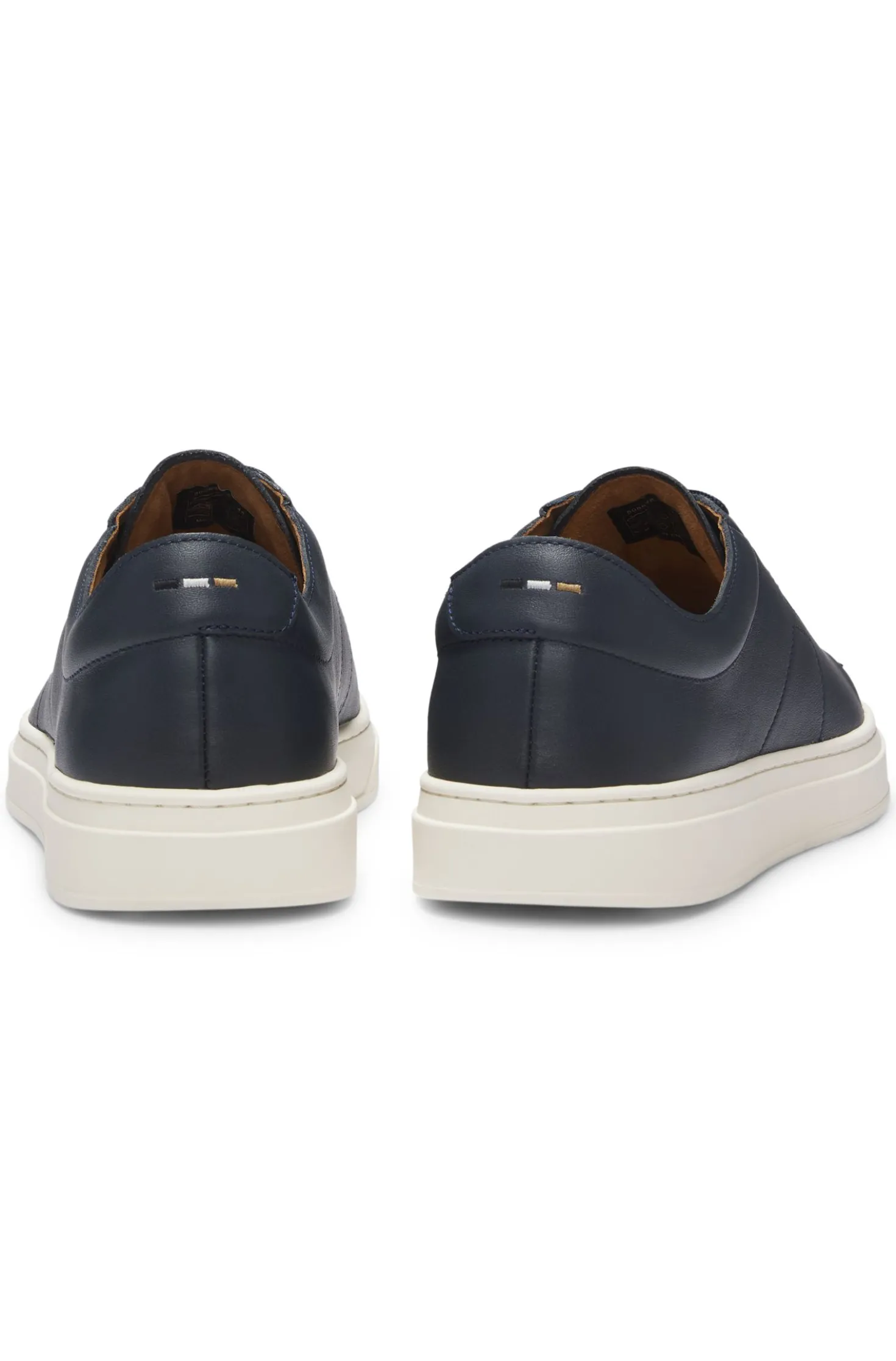 Low-top trainers in leather with embossed logo