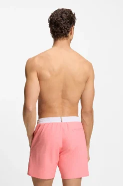 Medium-length swim shorts with contrast details