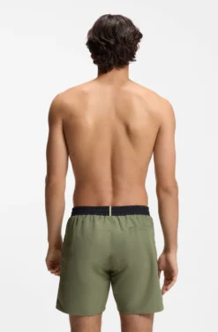 Medium-length swim shorts with contrast details