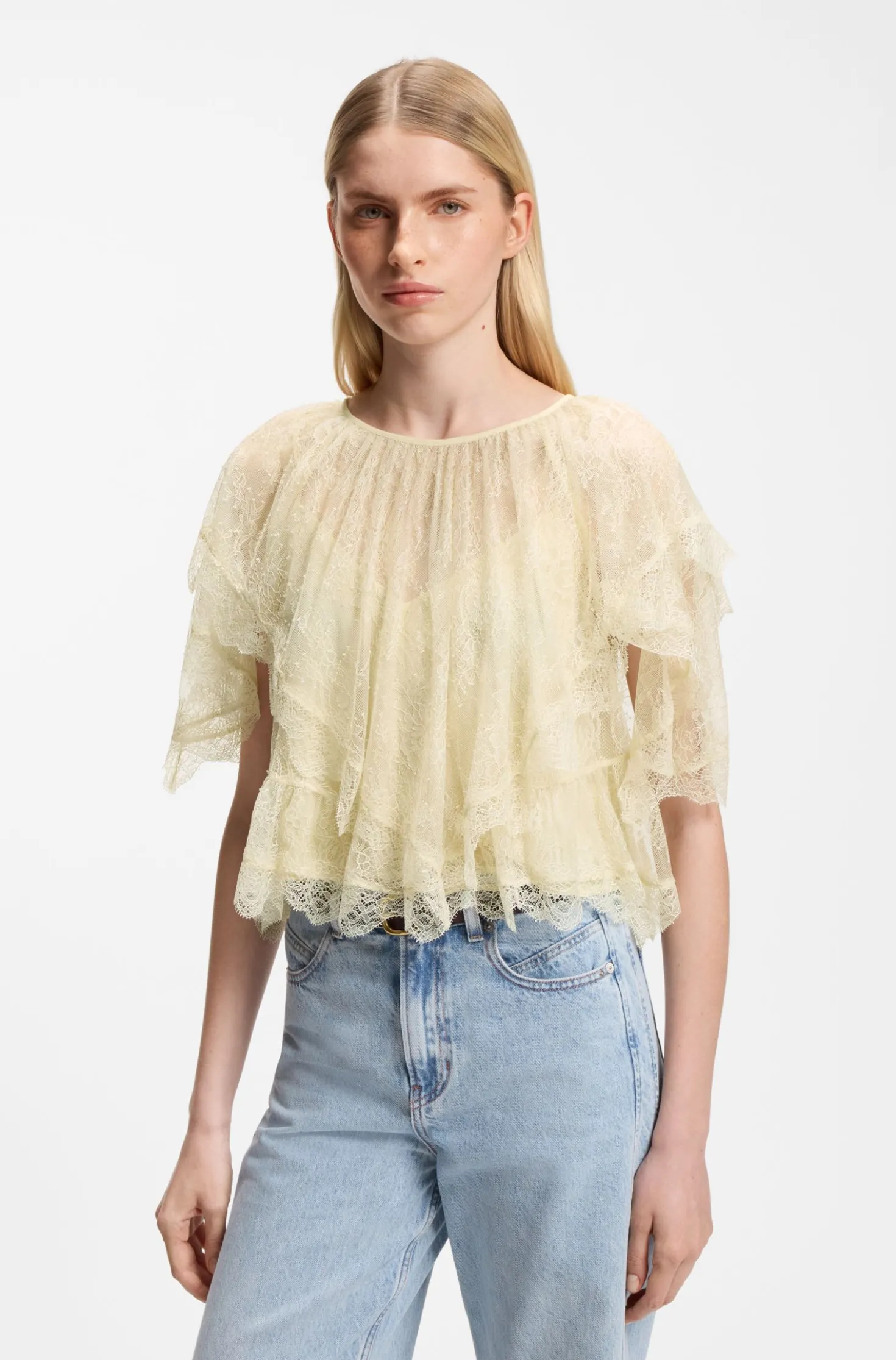 Mini cape blouse with lace trimmings
