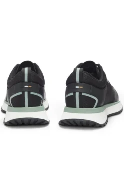 Mixed-material trainers with mesh details and branding