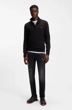 Mixed-material trainers with branded accents