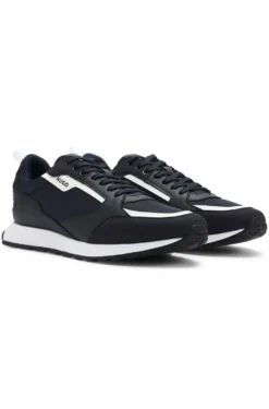 Mixed-material trainers with branded accents