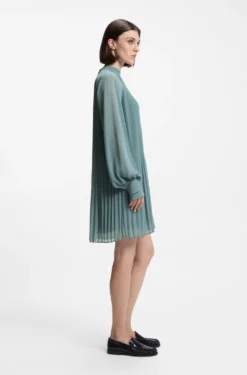 Plissé dress with sheer sleeves