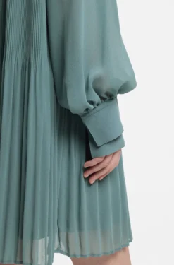 Plissé dress with sheer sleeves