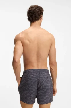 Printed swim shorts with logo badge