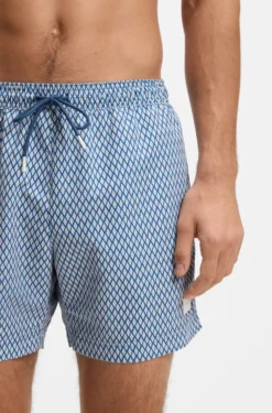 Printed swim shorts with logo badge