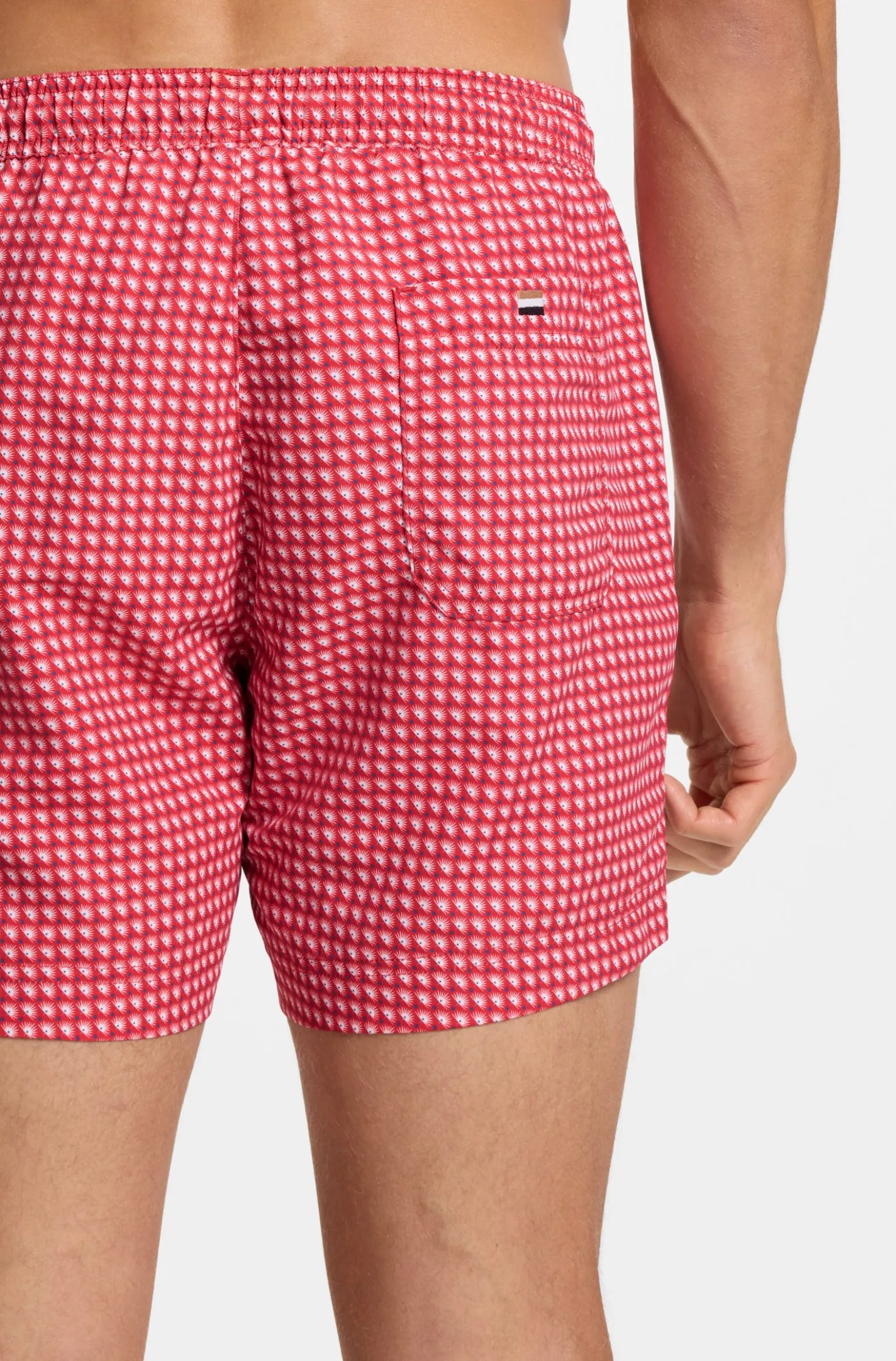 Printed swim shorts with logo badge