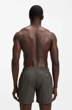 Printed swim shorts with logo badge