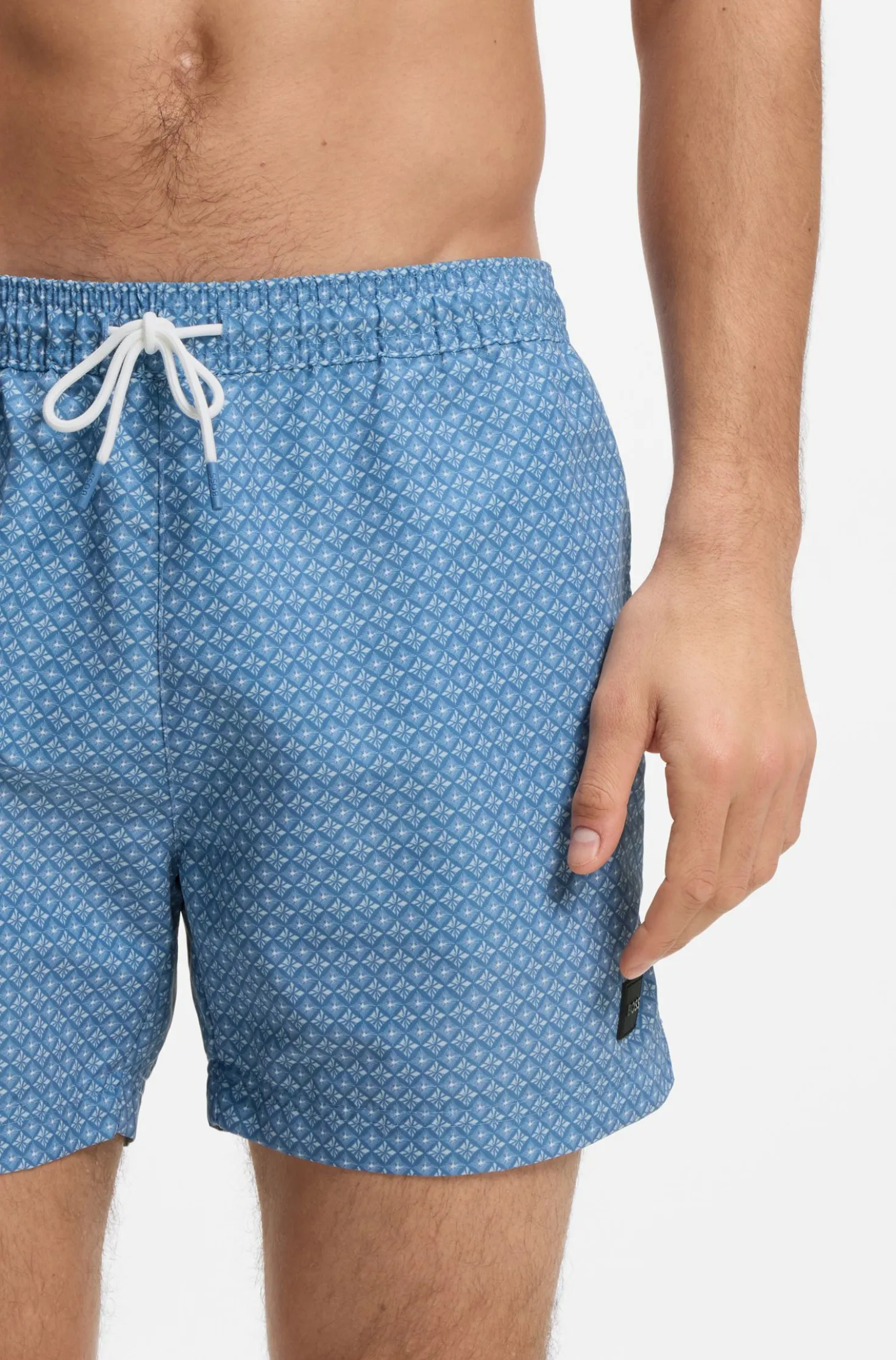 Printed swim shorts with logo badge