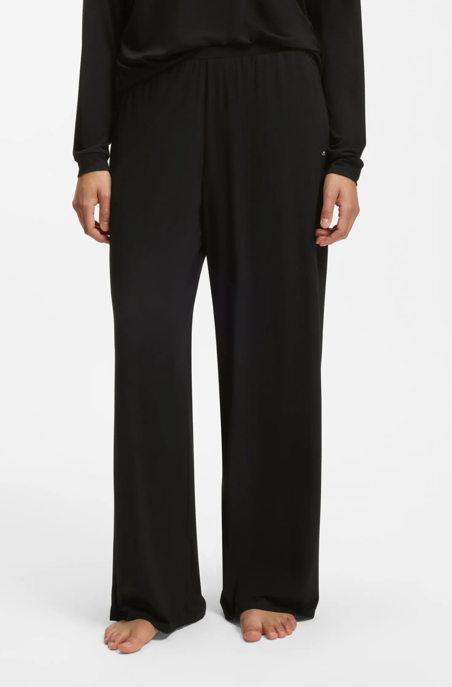 Pyjama bottoms with lace-trimmed pockets