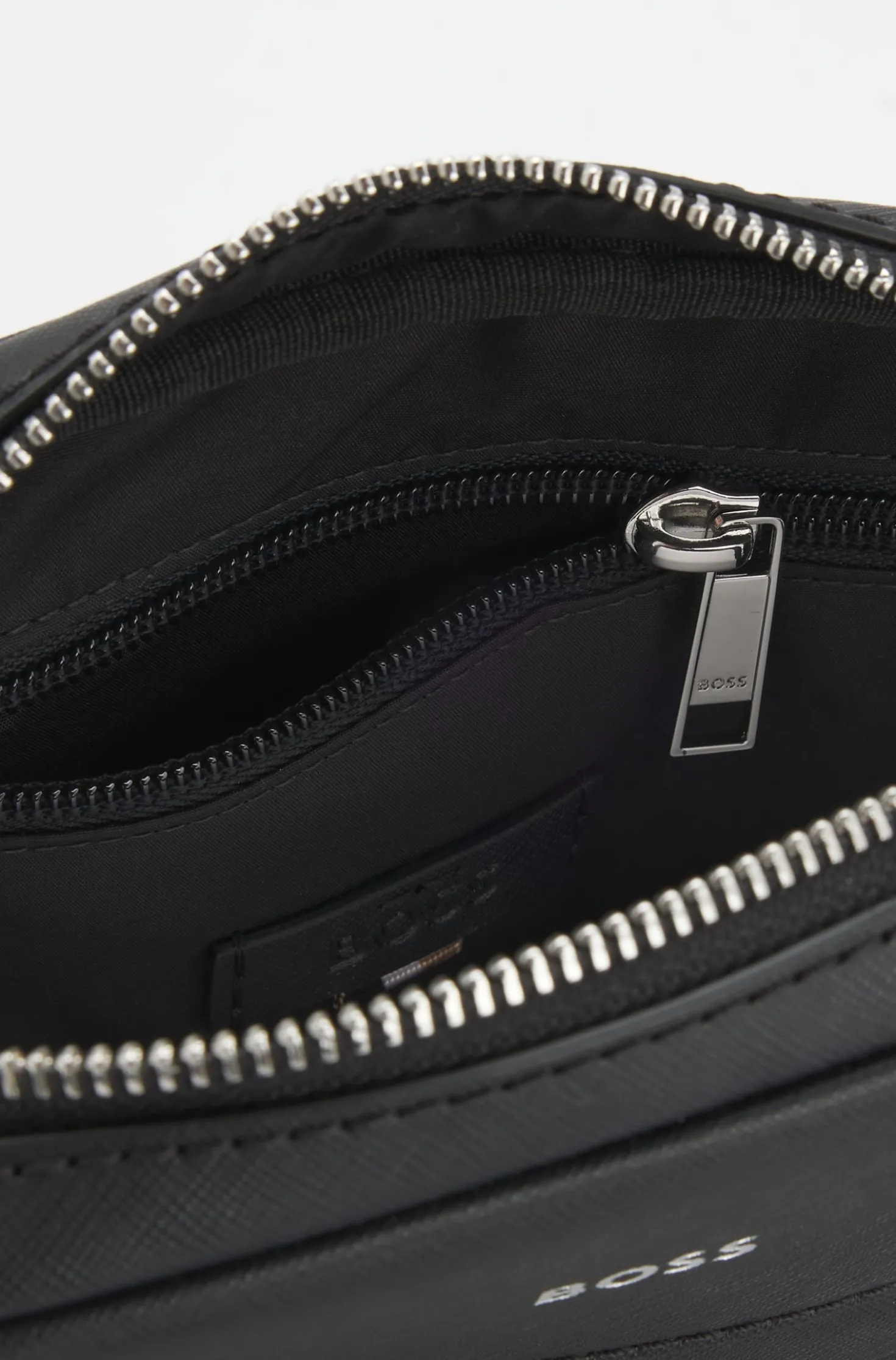 Recycled-leather reporter bag with adjustable logo strap