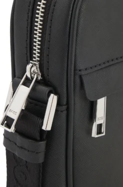 Recycled-leather reporter bag with adjustable logo strap