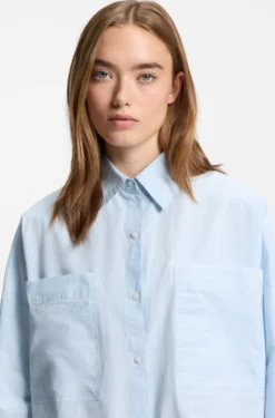 Relaxed-fit blouse in striped cotton poplin