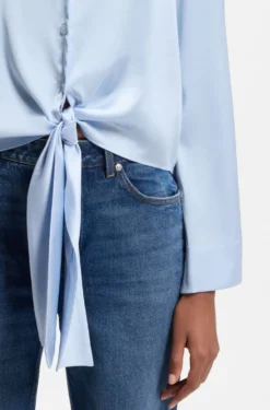 Relaxed-fit blouse with a tie-front feature