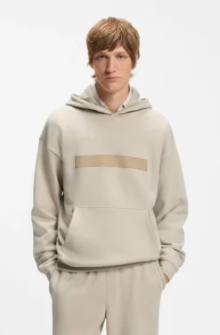 Relaxed-fit cotton-terry hoodie with wide-set logo