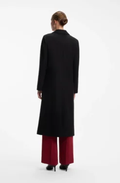 Relaxed-fit formal coat with monogram rivet