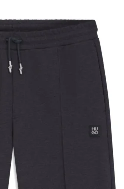 Relaxed-fit tracksuit bottoms with pintuck pleats