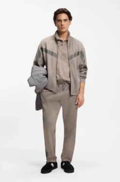 Relaxed-fit tracksuit bottoms with logo tape