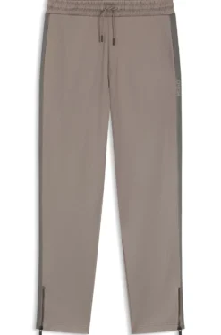 Relaxed-fit tracksuit bottoms with logo tape