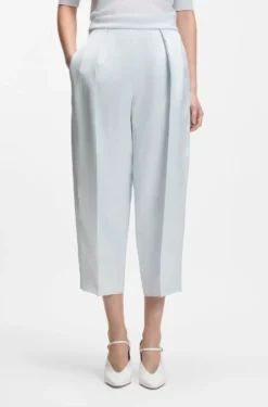 Relaxed-fit trousers in sateen with front pleats