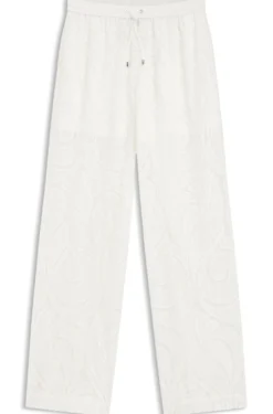 Relaxed-fit trousers with embroidered flowers