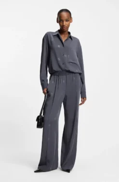 Relaxed-fit trousers with stacked logos