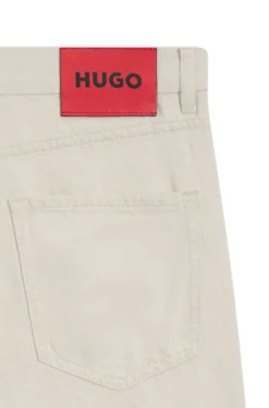 Relaxed-tapered-fit jeans in ecru denim