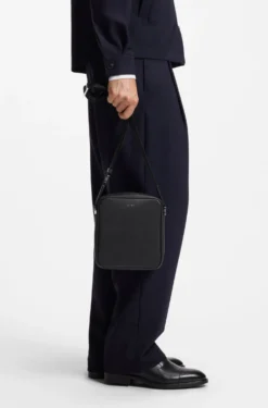 Reporter bag with silver-tone logo lettering