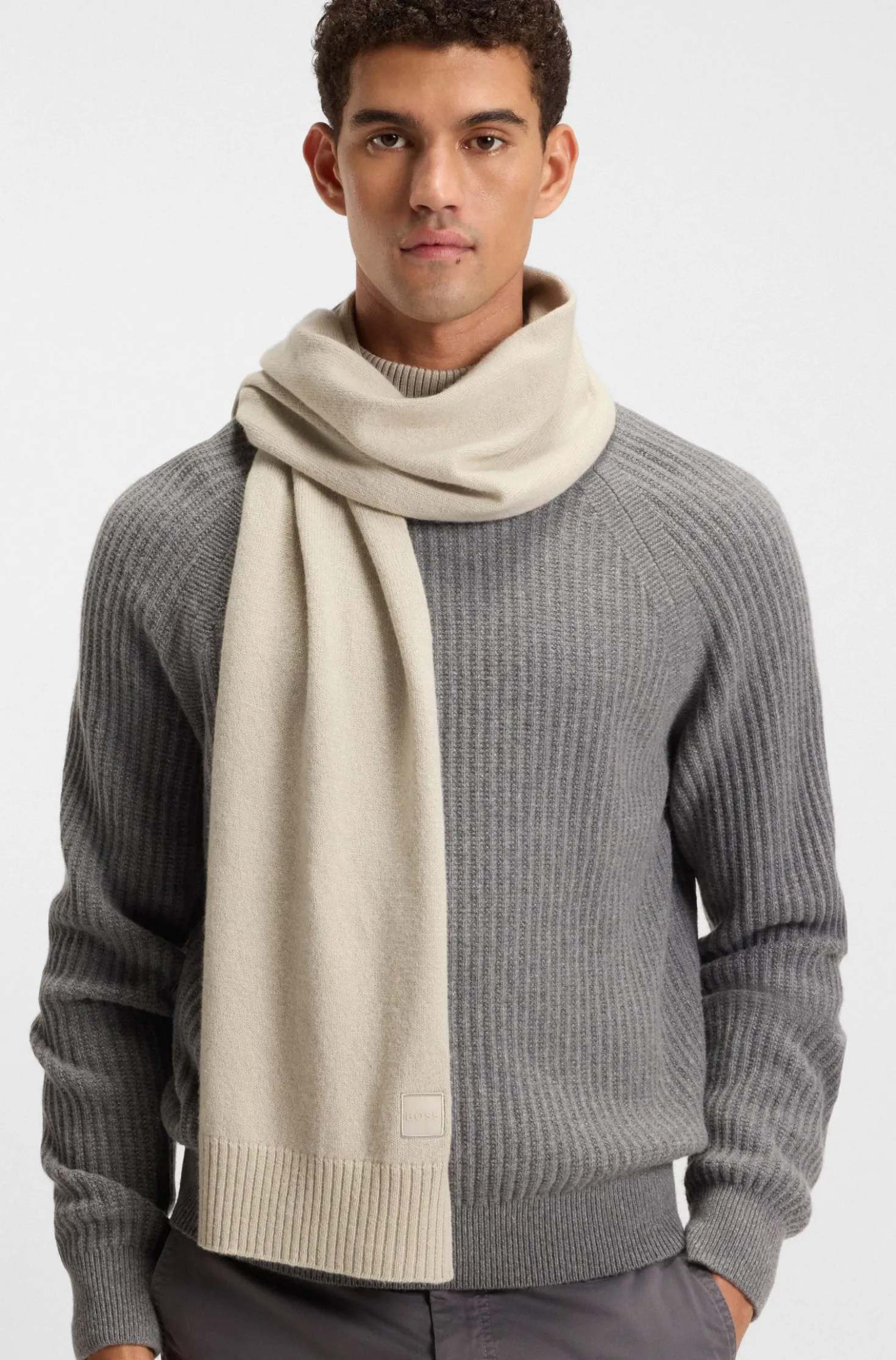 Ribbed-hem plain-knit scarf with woven logo badge