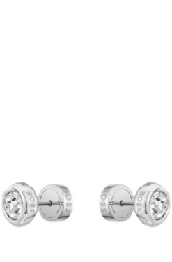 Silver-tone stud earrings with crystal core