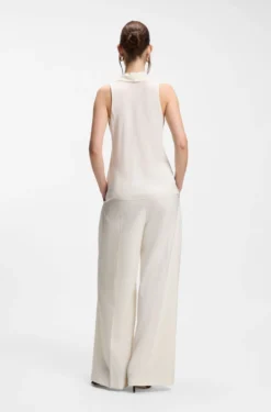 Sleeveless blouse in sandwashed silk with V neckline